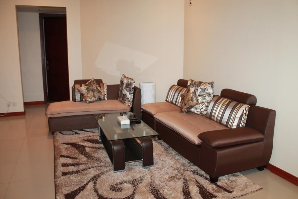 Al Hamra Plaza Apartment Манама Стая снимка