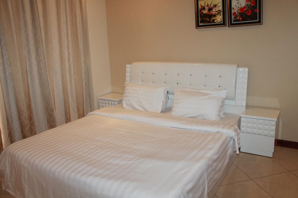 Al Hamra Plaza Apartment Манама Стая снимка